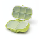 boîte à pilule de couleur verte vide sur fond blanc