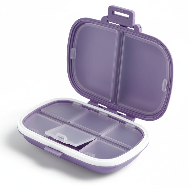 boîte à pilule de couleur violet sur fond blanc