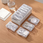 boîte rangement pour câble de chargeur posé sur un bureau