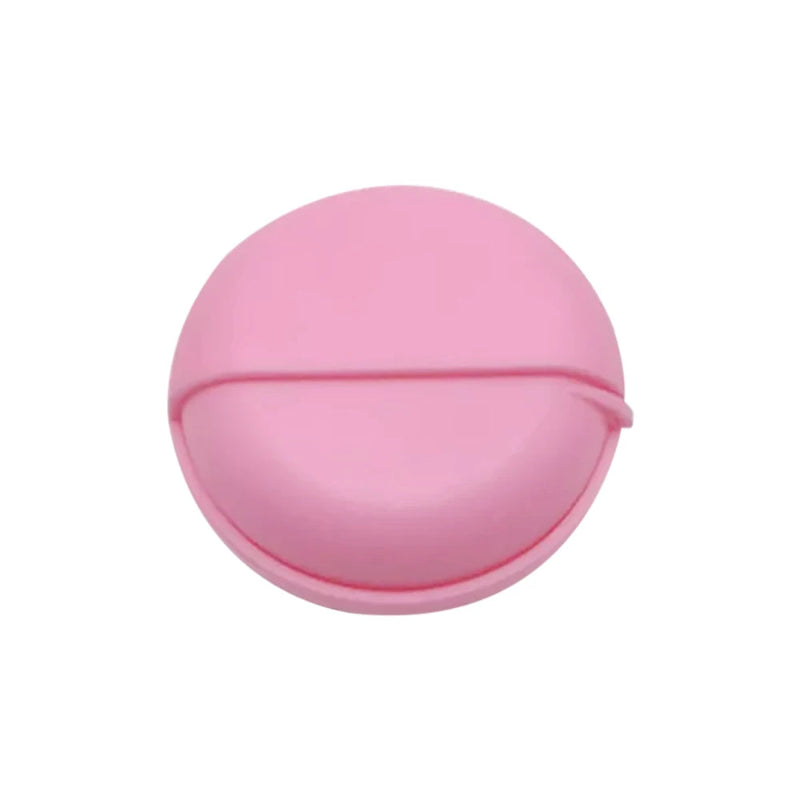 boîte de rangement pour écouteurs de couleur rose sur fond blanc