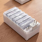 1 boîte regroupant 6 boîtes et 2 chargeurs