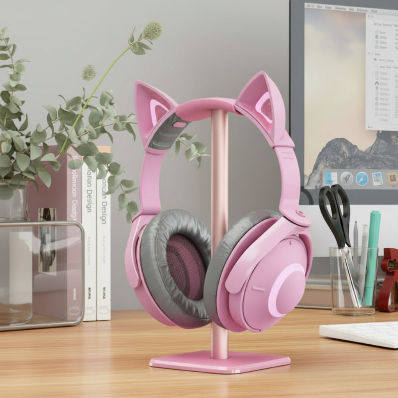 casque rose sur support casque audio rose