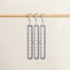 cintre pliable de couleur grise x3