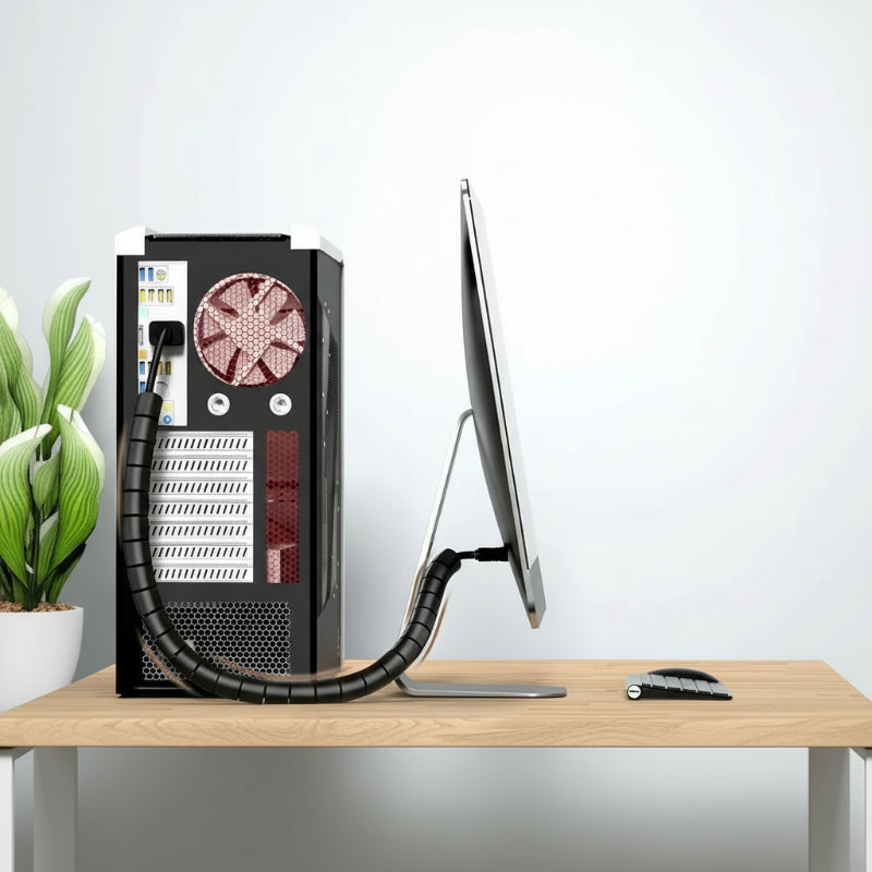 gaine spirale utilisée pour ranger les câbles d'un pc fixe sur un bureau