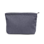 organisateur cosmétique pour voyage de couleur gris sur fond blanc