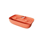 l'organisateur d’évier antidérapant de couleur orange sur fond blanc