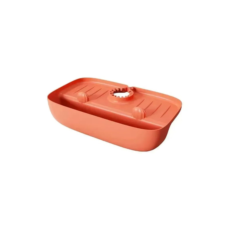l'organisateur d’évier antidérapant de couleur orange sur fond blanc