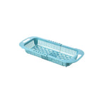 organisateur d’évier rétractable vide de couleur turquoise sur fond blanc