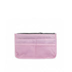 organisateur multi compartiments pour sac de couleur rose sur fond blanc