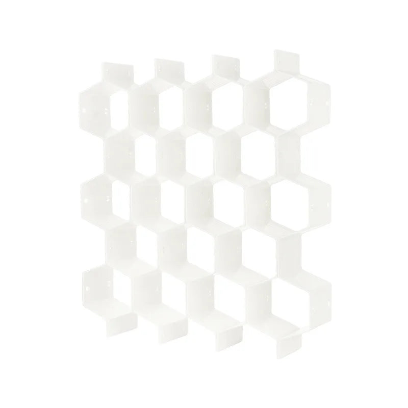 organisateur de tiroir en nid d’abeille de couleur blanc sur fond blanc