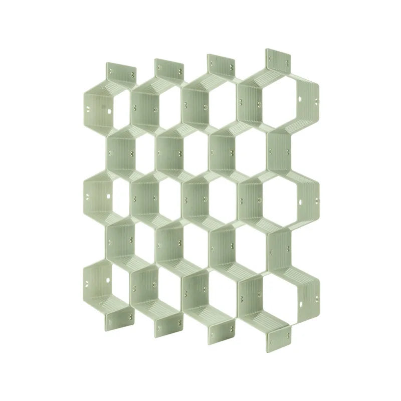 organisateur de tiroir en nid d’abeille de couleur vert sur fond blanc
