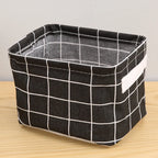 petit panier de rangement adapté pour salle de bain de couleur noir