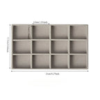plateau pour bijoux en velours de couleur gris et 12 cases
