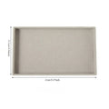 plateau pour bijoux en velours de couleur gris et vide