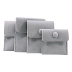 pochette organisateur de bijoux en velours de couleur gris clair