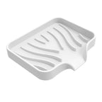 porte savon de couleur blanc sur fond blanc