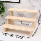 présentoir en bois pour rangement parfum sur fond blanc avec 3 étages