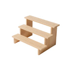 présentoir en bois pour rangement parfum sur fond blanc