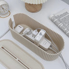 une rallonge dans la boîte pour câble management de couleur blanc cassé