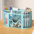 le rangement fourniture scolaire bleu clair remplit et posé sur le bureau