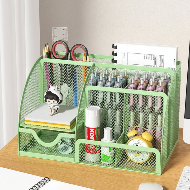 le rangement matériel scolaire vert émeraude remplit et posé sur le bureau