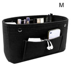 le rangement sac à main de couleur noir et de taille M