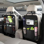 le rangement siège arrière  installé dans une voiture beige 