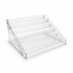 rangement pour vernis à ongles transparent vide sur fond blanc
