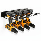 support mural pour visseuses avec visseuses sur fond blanc