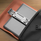 support pliable pc portable plié et rangé dans un sac