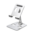 support pour téléphone vide de couleur argent sur fond blanc