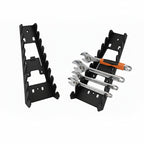 2 supports pour clés plates de couleur noir 1 vide 1 avec 3 clés sur fond blanc