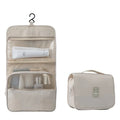 la trousse de maquillage pour voyage de couleur beige