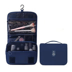 la trousse de maquillage pour voyage de couleur bleu marine